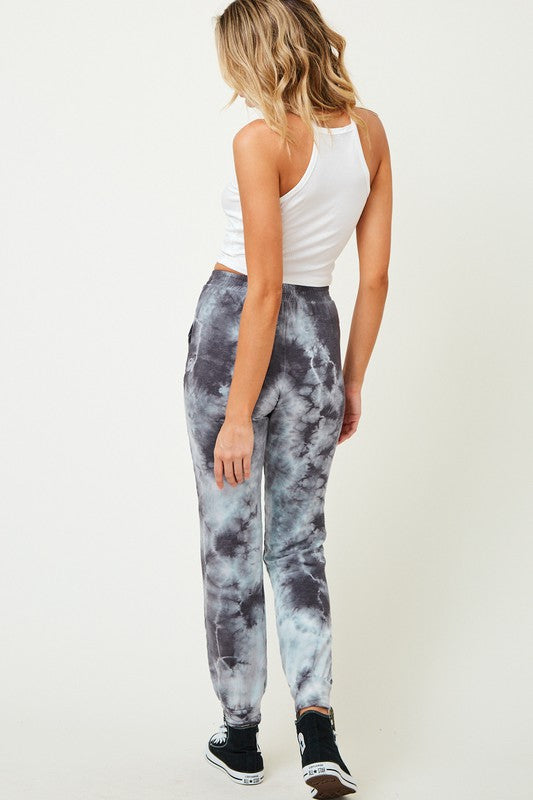 Fitted tie dye jogger pants with pockets and elastic waist