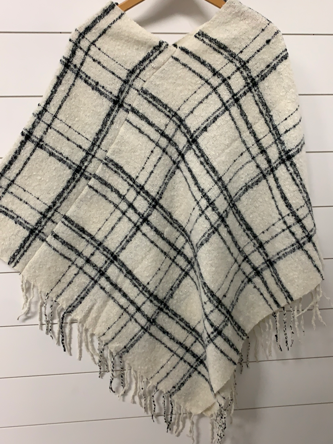 Plaid print poncho with fringes